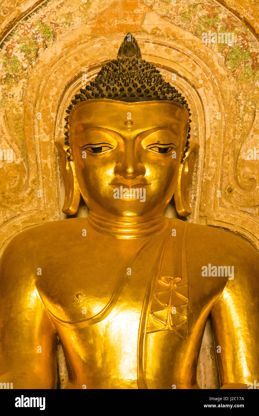 Myanmar. Bagan. Htilominlo Temple. Golden Buddha. Stock Photo