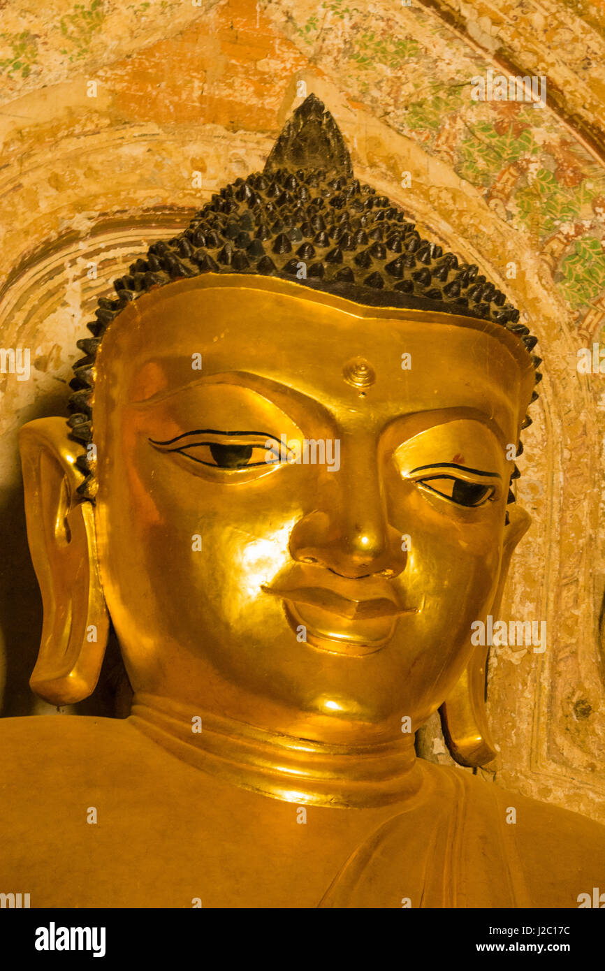 Myanmar. Bagan. Htilominlo Temple. Golden Buddha. Stock Photo