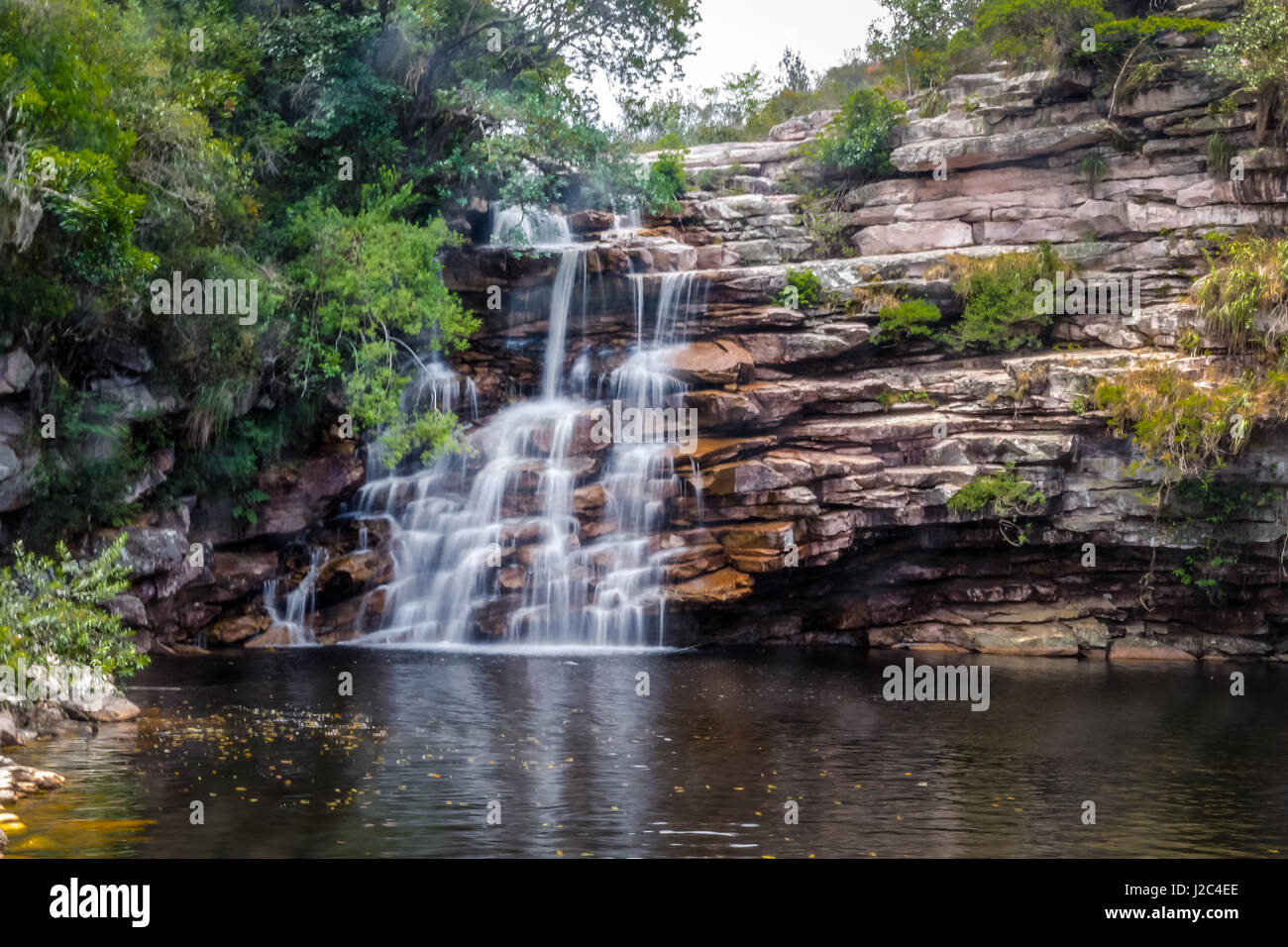 Poco do Diabo Waterfall in Mucugezinho River in Chapada Diamantina - Bahia, Brazil Stock Photo