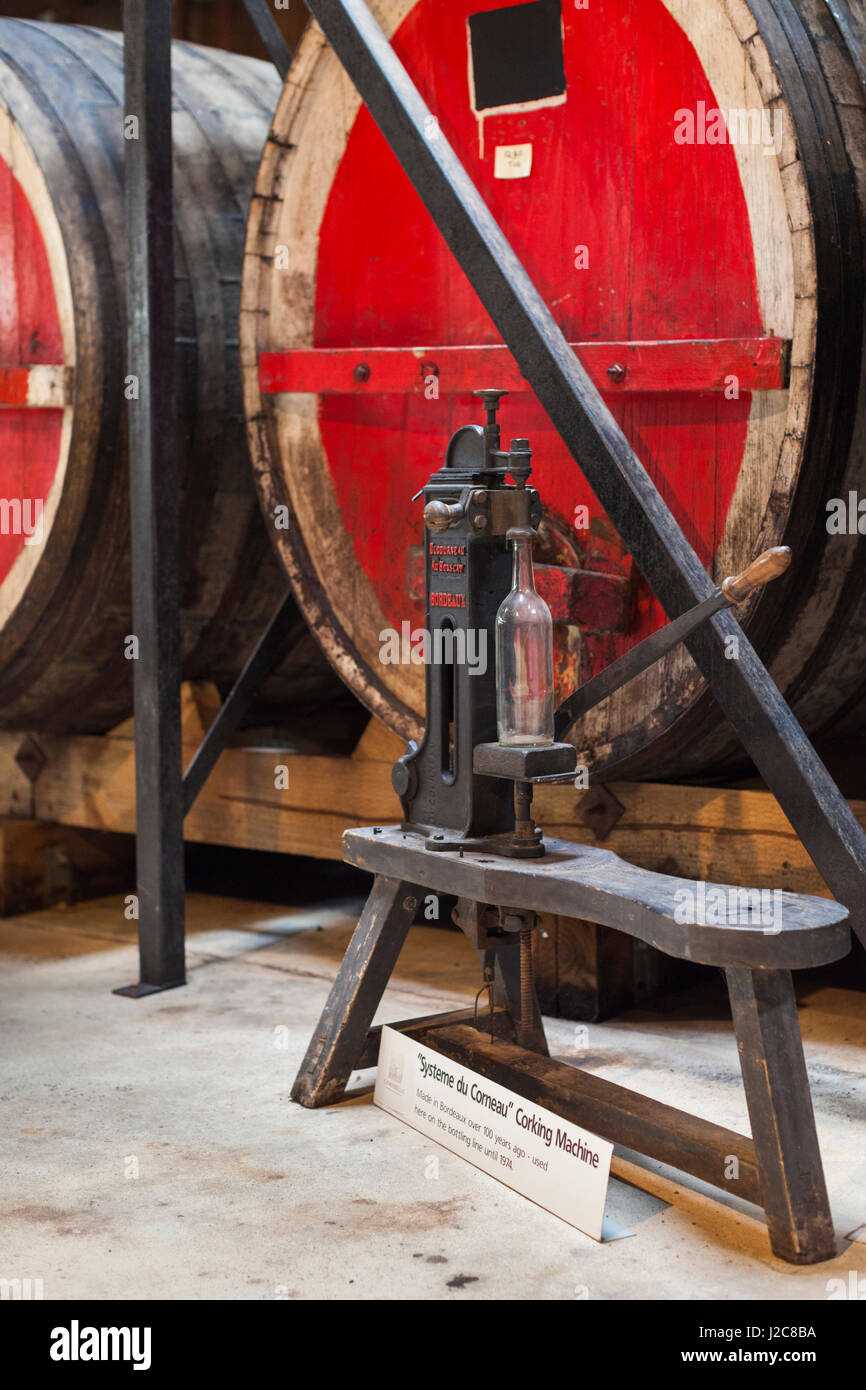 Australia, Victoria, Rutherglen, Campbell's Winery, barrels and antique corking machine Stock