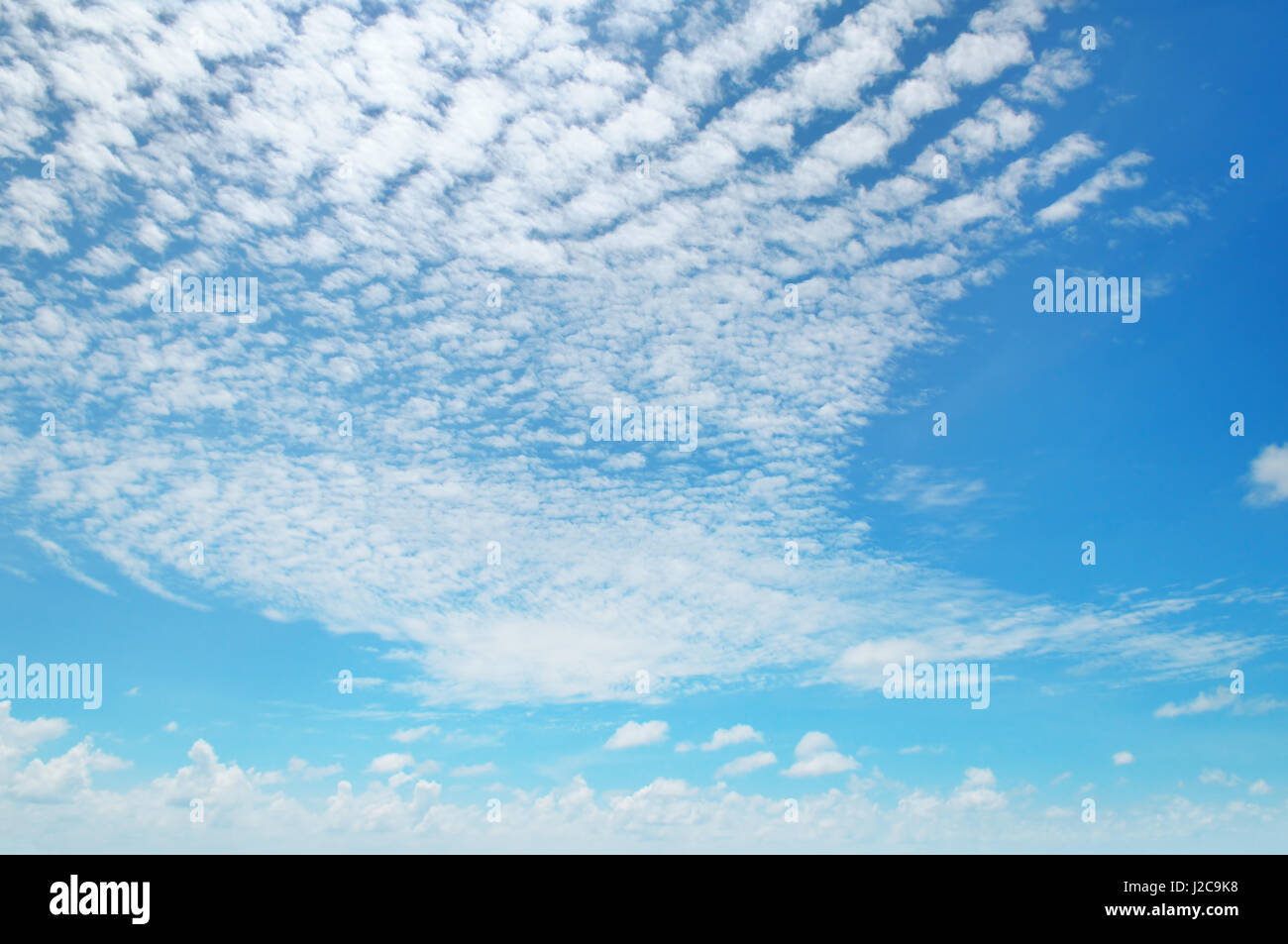 fluffy clouds in the blue sky Stock Photo - Alamy
