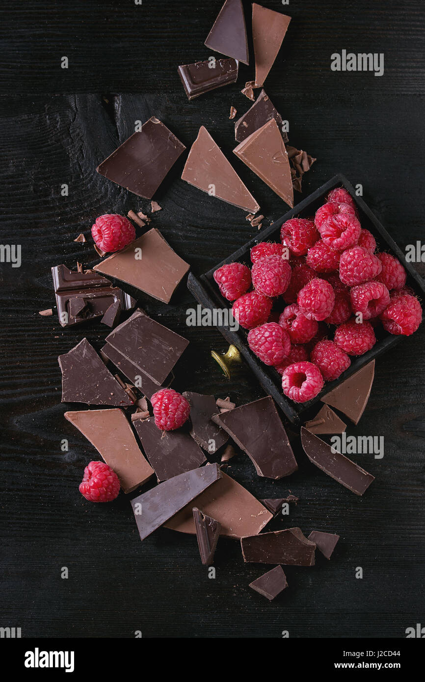 Variety of chopping chocolate with raspberries Stock Photo Alamy