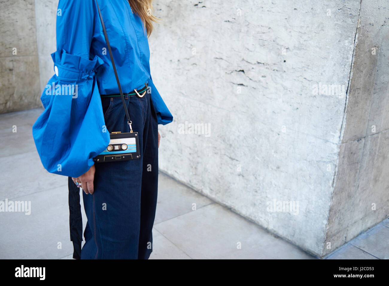 Woman wearing blue blouse standing hi-res stock photography and images ...