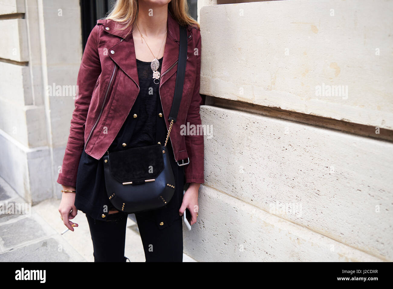 Woman black leather jacket smoking hires stock photography and images