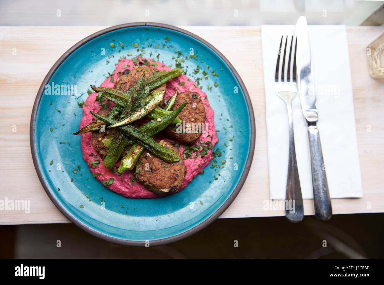 Plate Of Lamb Koftas On Table In City Restaurant Stock Photo