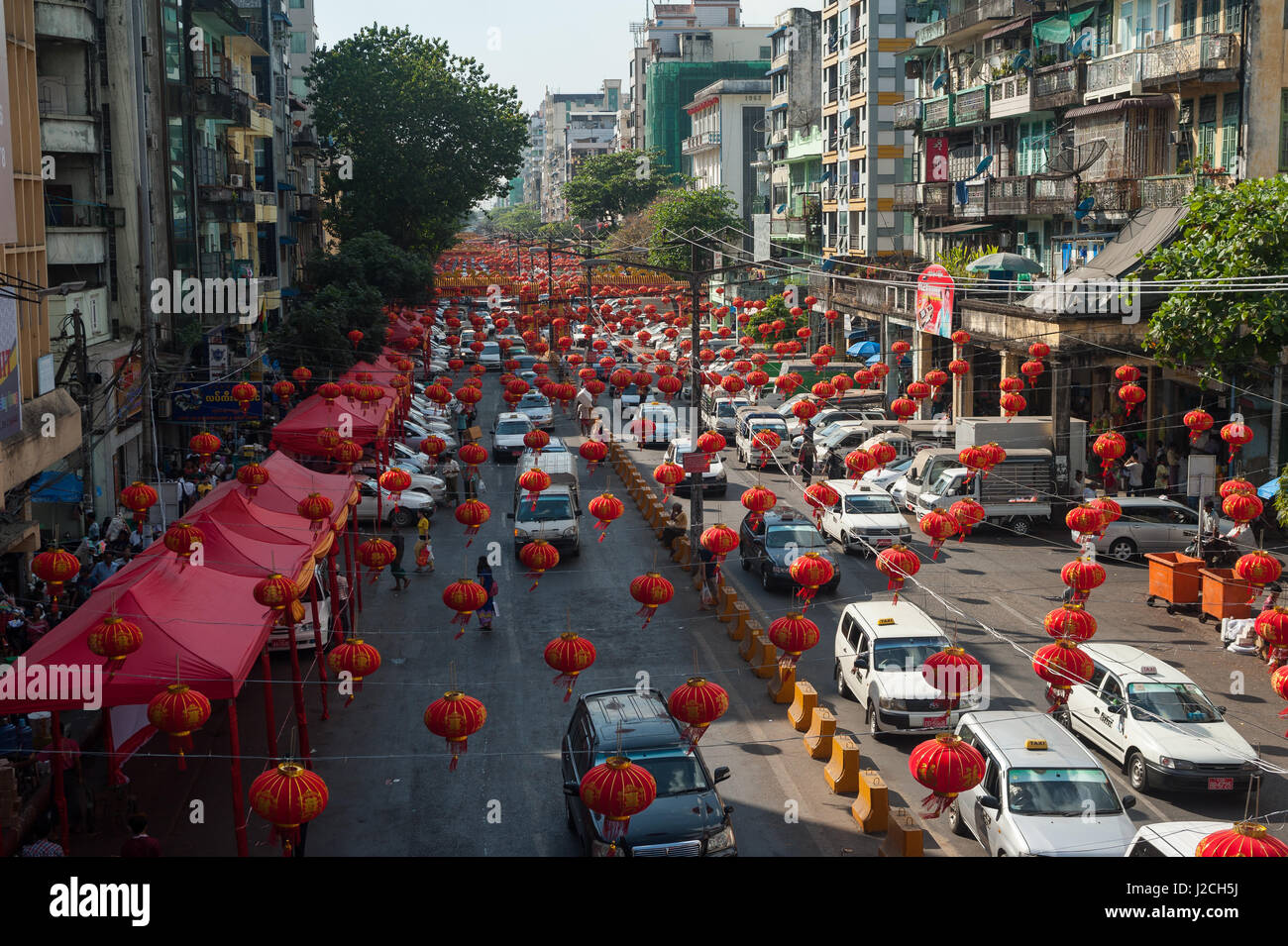 27.01.2017, Yangon, Republic of the Union of Myanmar, Asia - Lanterns are seen hanging above a street in Chinatown. Stock Photo