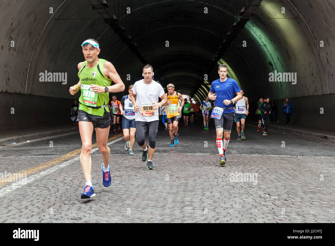 Rome, Italy - April 2nd, 2017: Athletes of the 23rd Rome Marathon to the passage of the tunnel Umberto I, a few kilometers from the finish. Stock Photo