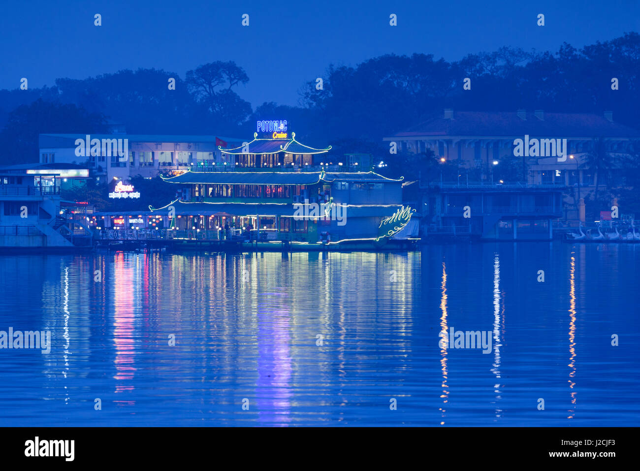 Vietnam, Hanoi. Tay Ho, West Lake, floating restaurant, dusk Stock Photo