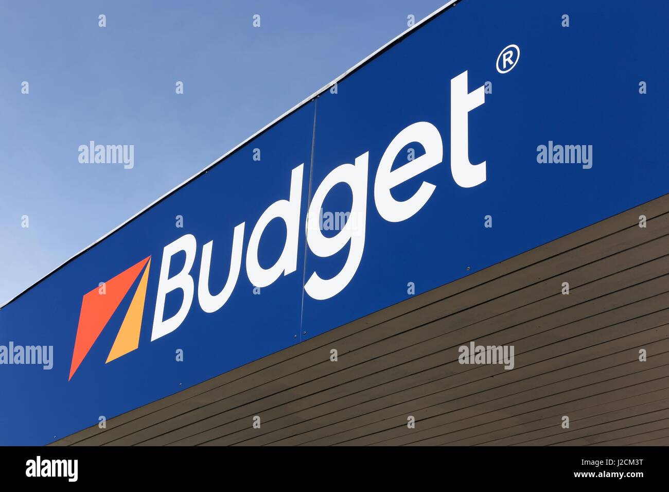 Vejle, Denmark - March 25, 2017: Budget logo on a wall. Budget is an American car rental company that was founded in 1958 in Los Angeles Stock Photo