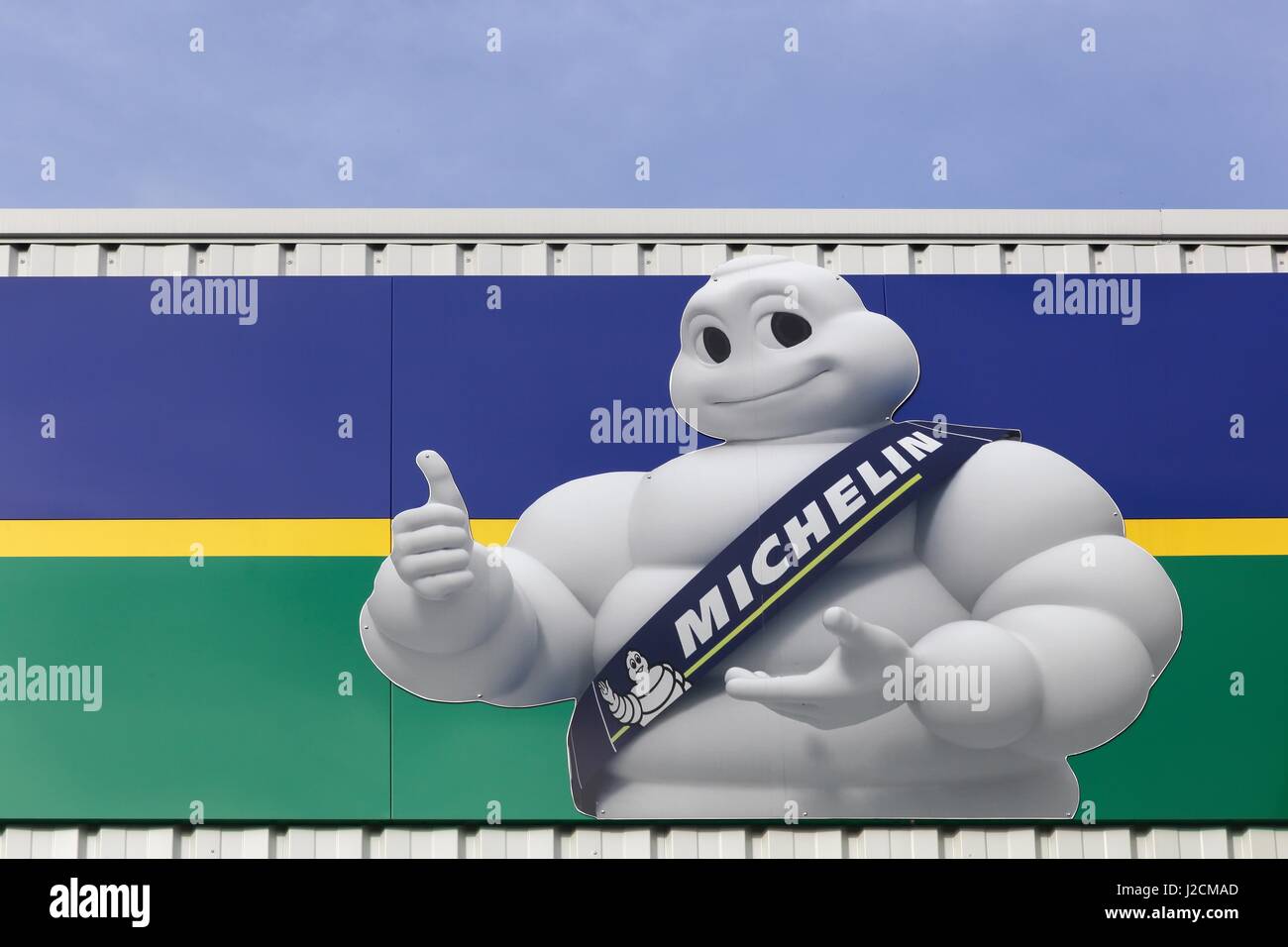Villefranche, France - February 12, 2017: Michelin logo on a wall. Michelin is a tire manufacturer based in Clermont-Ferrand in France Stock Photo