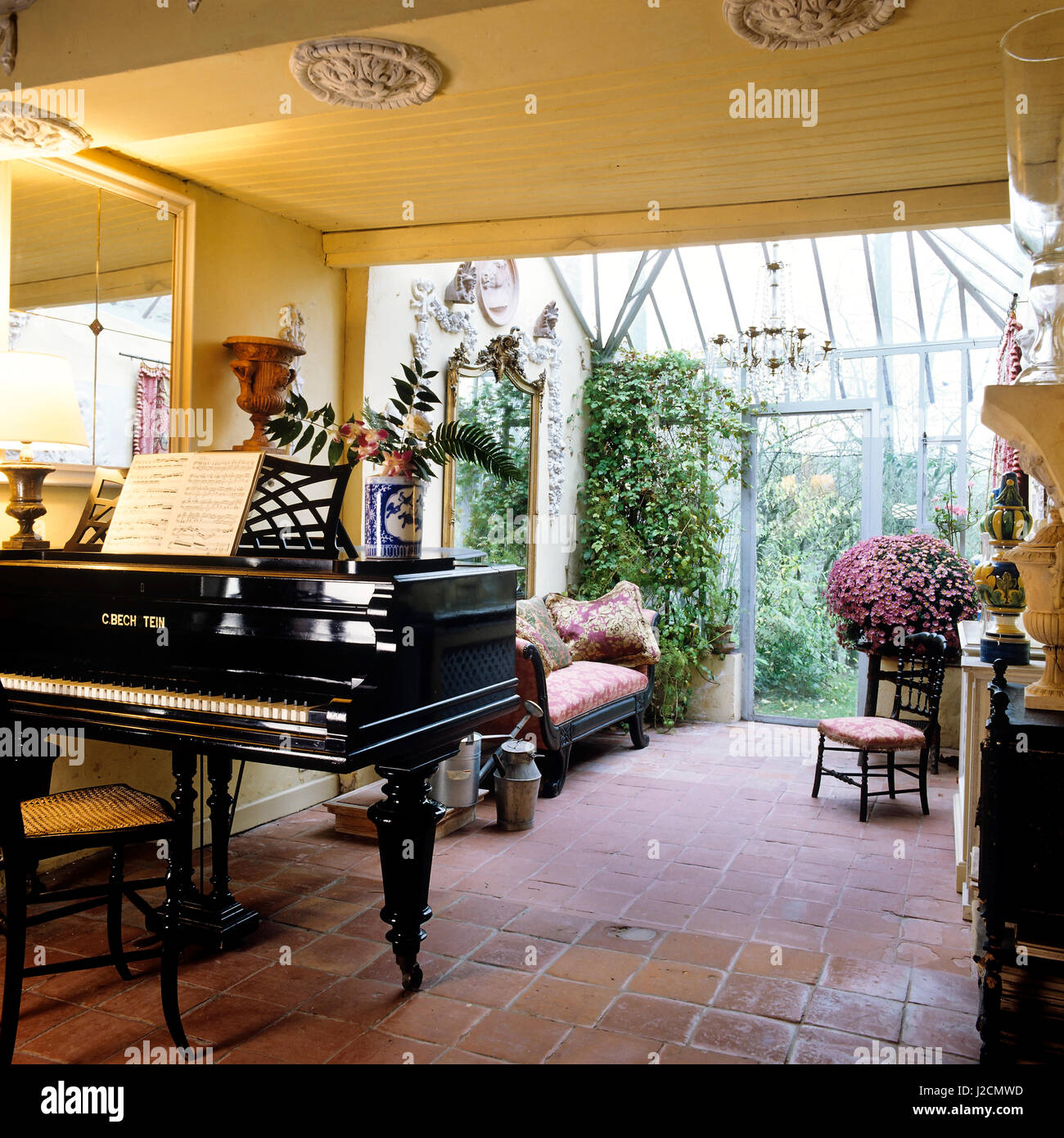 Piano by conservatory. Stock Photo