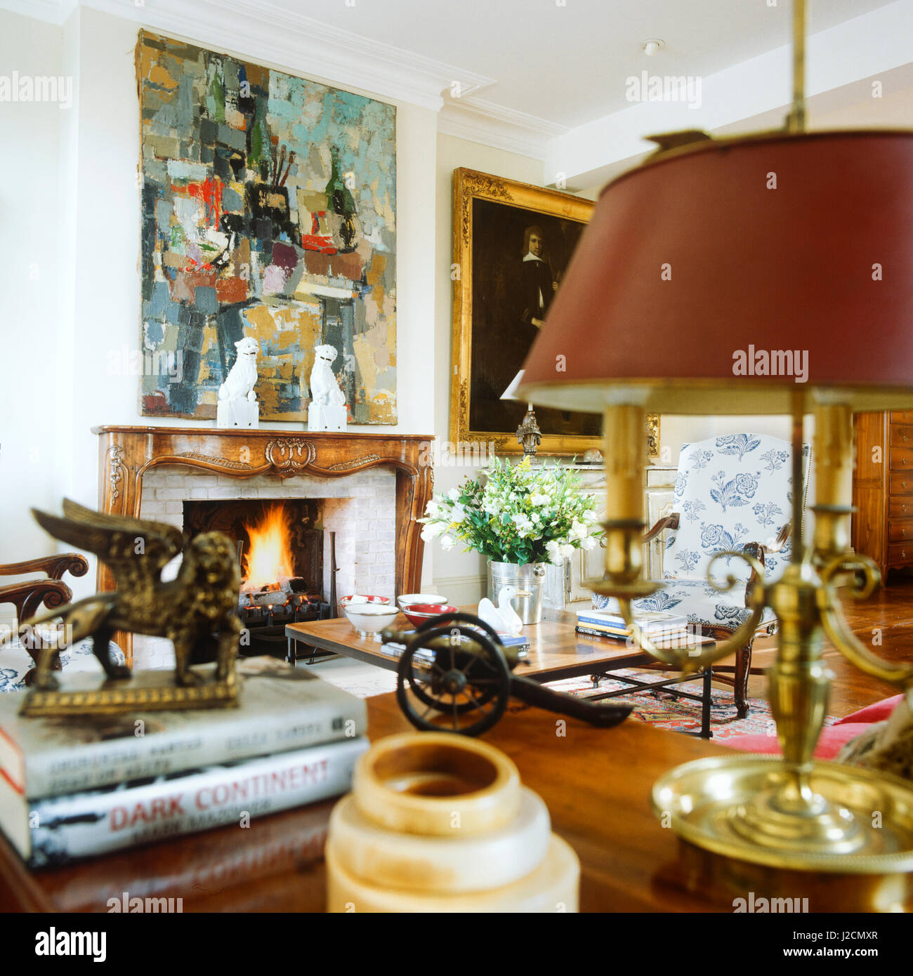 Living Room With Painting Above Fireplace Stock Photo 139192111