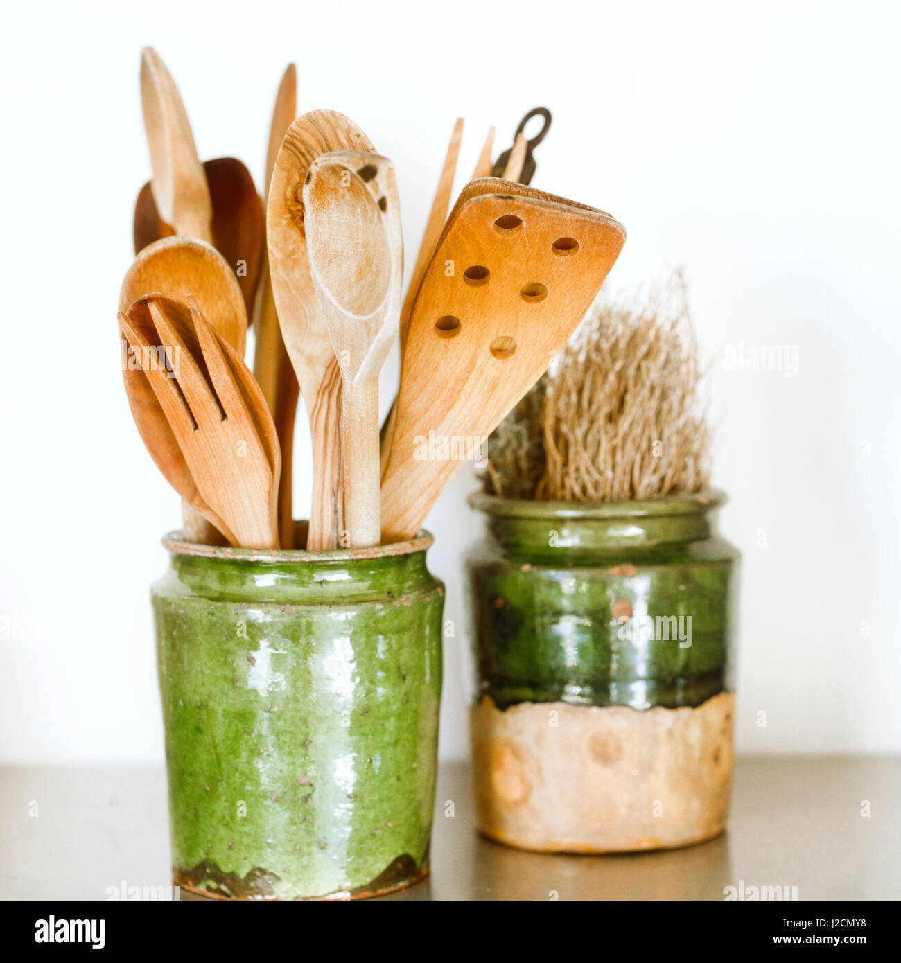 Assorted kitchen utensils in vase Stock Photo Alamy