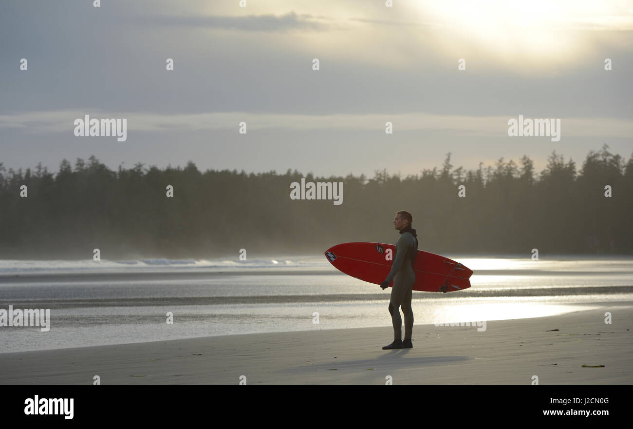Canada, British Columbia, Vancouver Island. Man in wetsuit standing