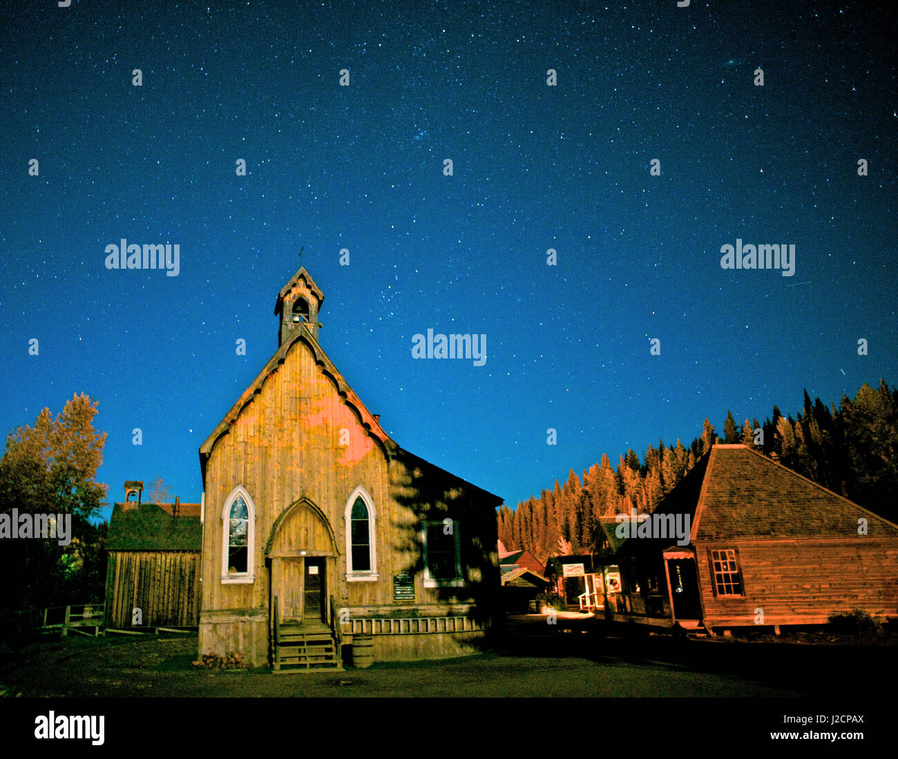 St. Savior's church under a summer night sky in Barkerville, B.C
