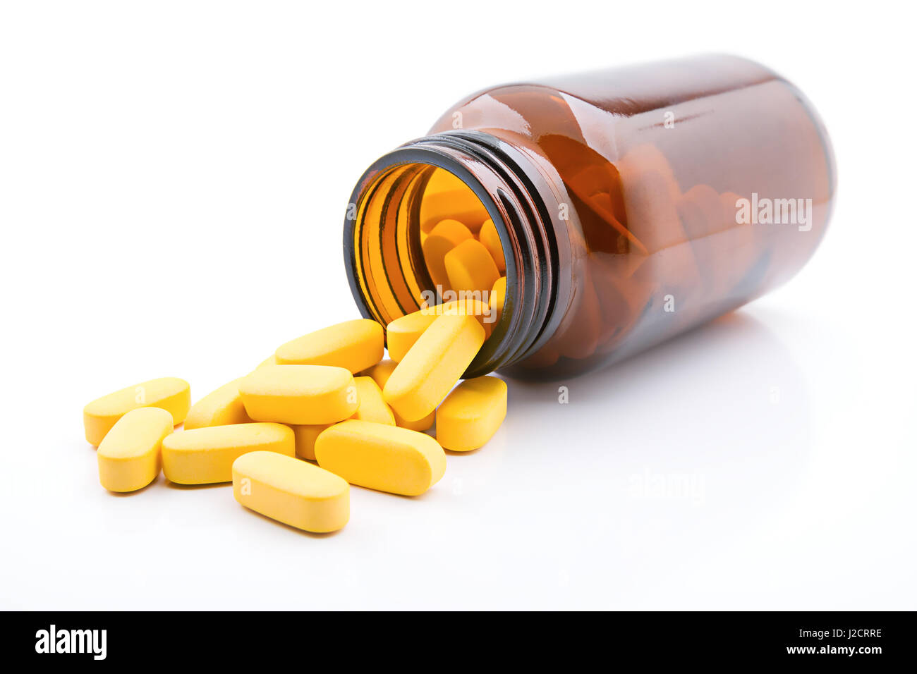 Download Group Of Yellow Pills In Bottle On A White Background Stock Photo Alamy Yellowimages Mockups