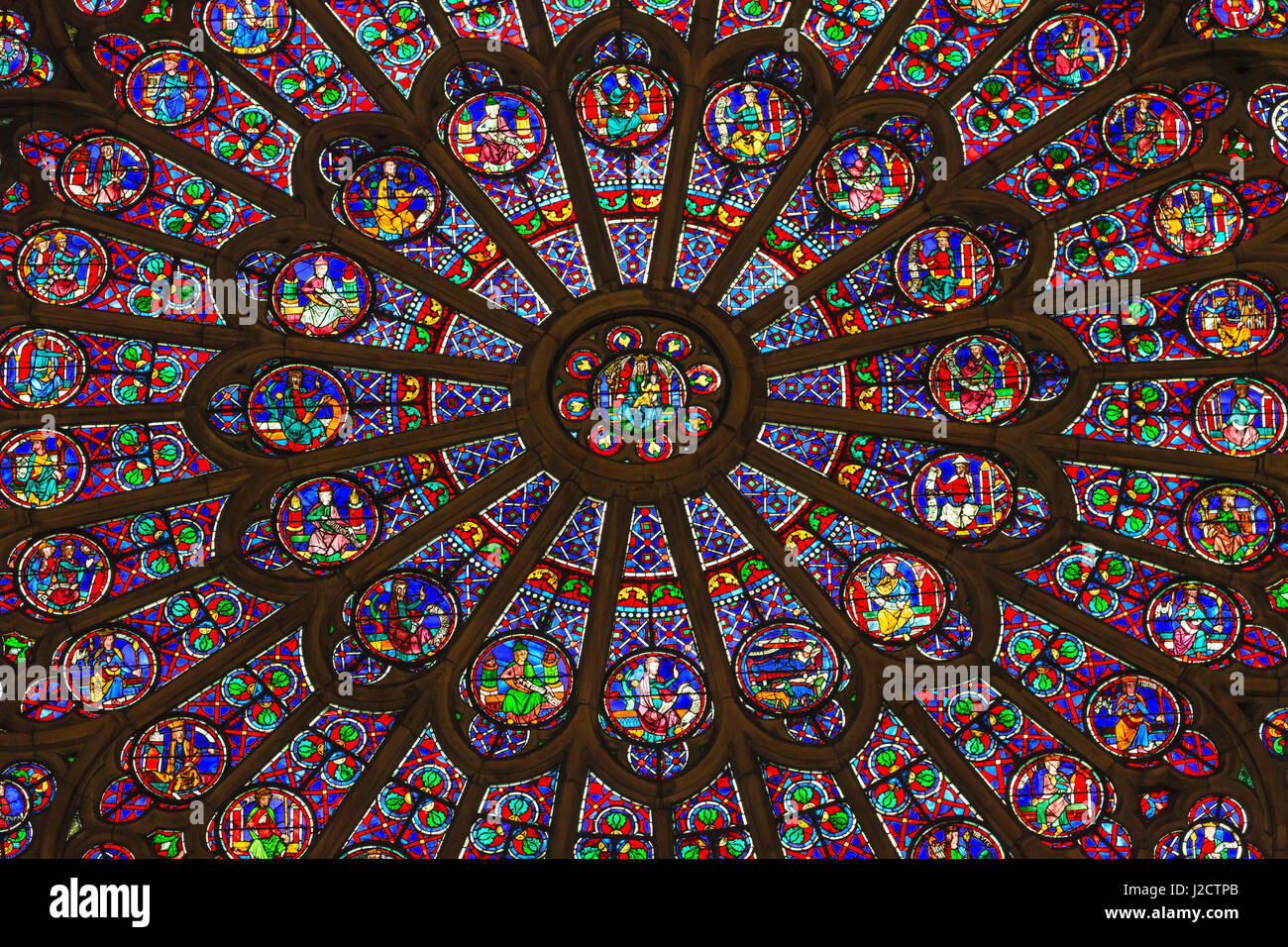 North Rose Window Virgin Mary Jesus Disciples Stained Glass Notre Dame Cathedral Paris, France. Notre Dame was built between 1163 and 1250 AD. Virgin Mary Rose Window oldest in Notre Dame from 1250. Stock Photo