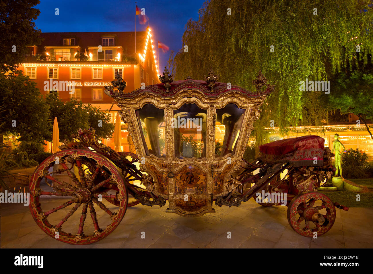 Europe, Germany, Lake Constance. Composite of 18th century carriage in front of modern hotel. Credit as: Jim Zuckerman / Jaynes Gallery / DanitaDelimont.com Stock Photo