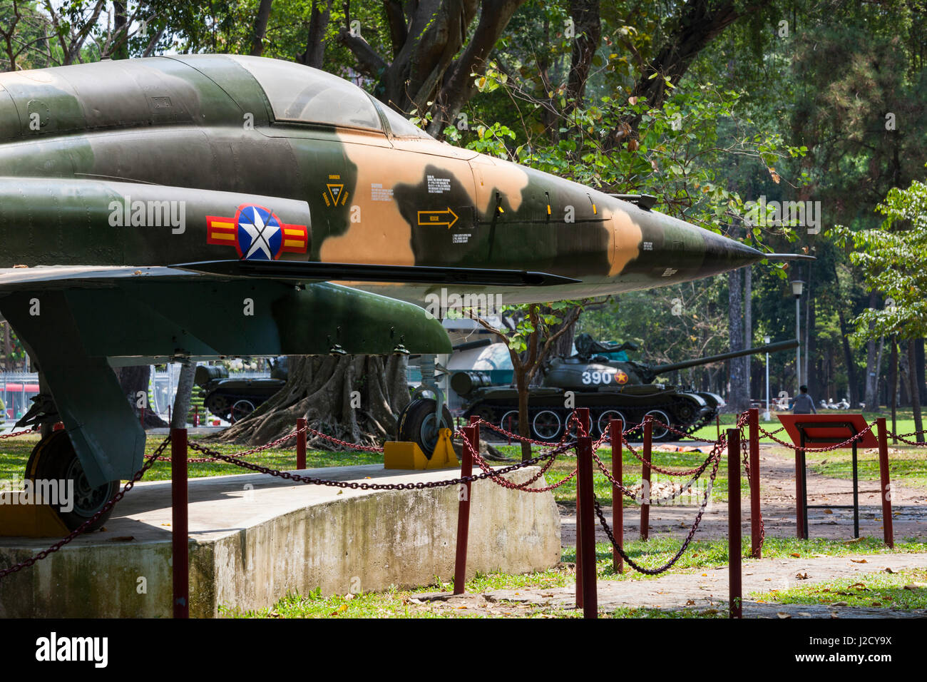 Vietnam, Ho Chi Minh City. Reunification Palace, former seat of South Vietnamese Government, Former South Vietnamese F-5E fighter plane used to bomb the palace at the end of the Vietnam War Stock Photo