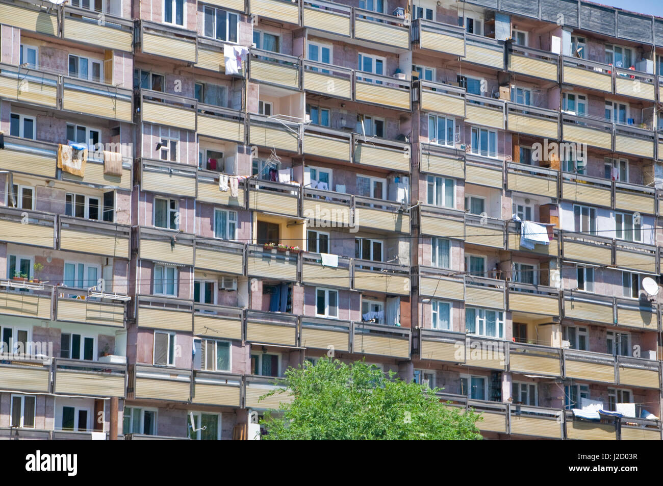 Facade of an apartment block with balconies, Yerevan, Armenia Stock