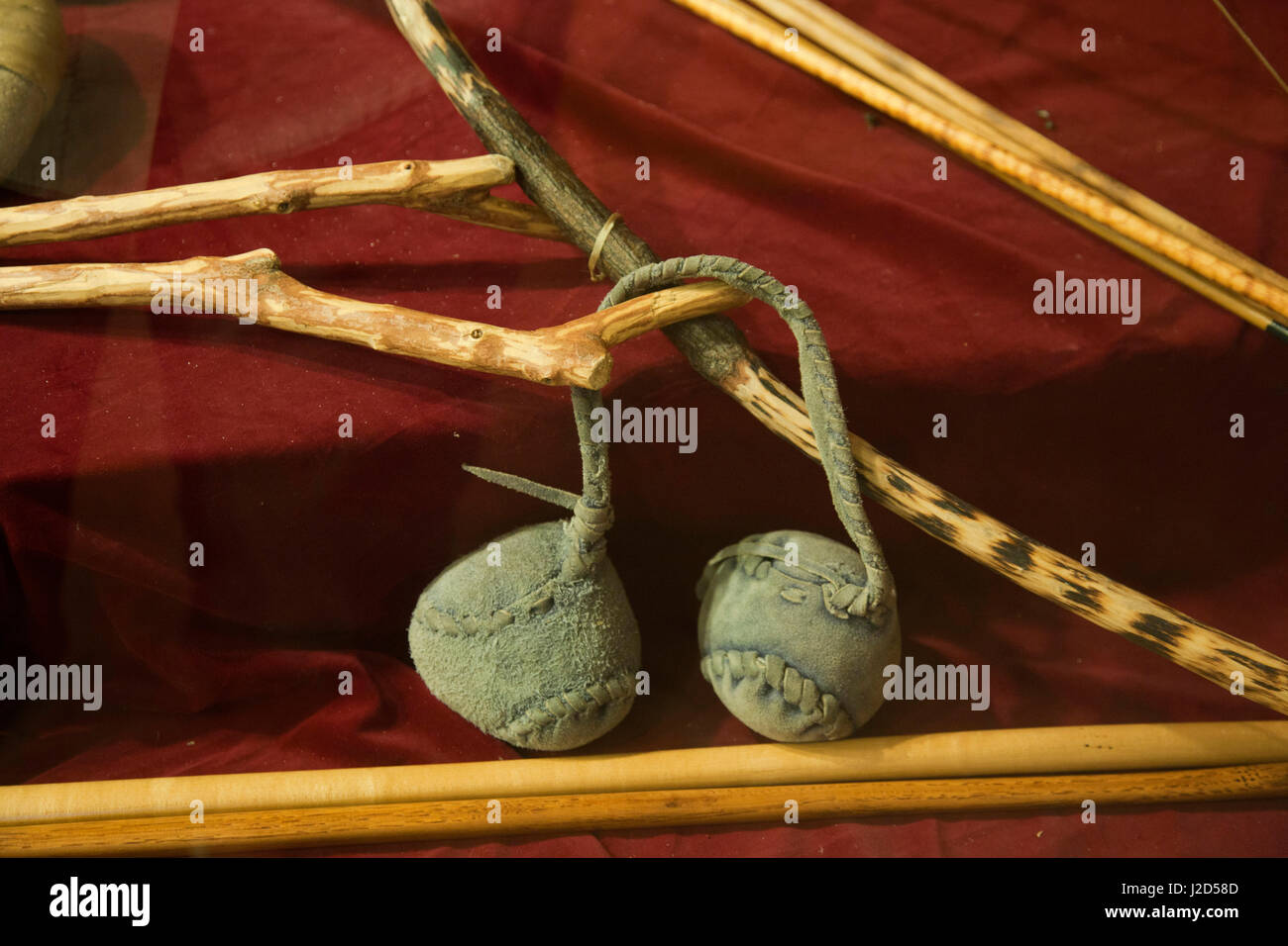The double ball game, popular by Iroquois, was played by women. The game resembled lacrosse. The double ball was composed of two small oblong deerskin bags joined together by an eight-inch deerskin thong. Stock Photo