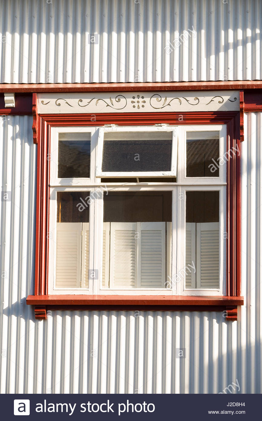 Window With Decorative Trim In Corrugated Iron And Steel Clad