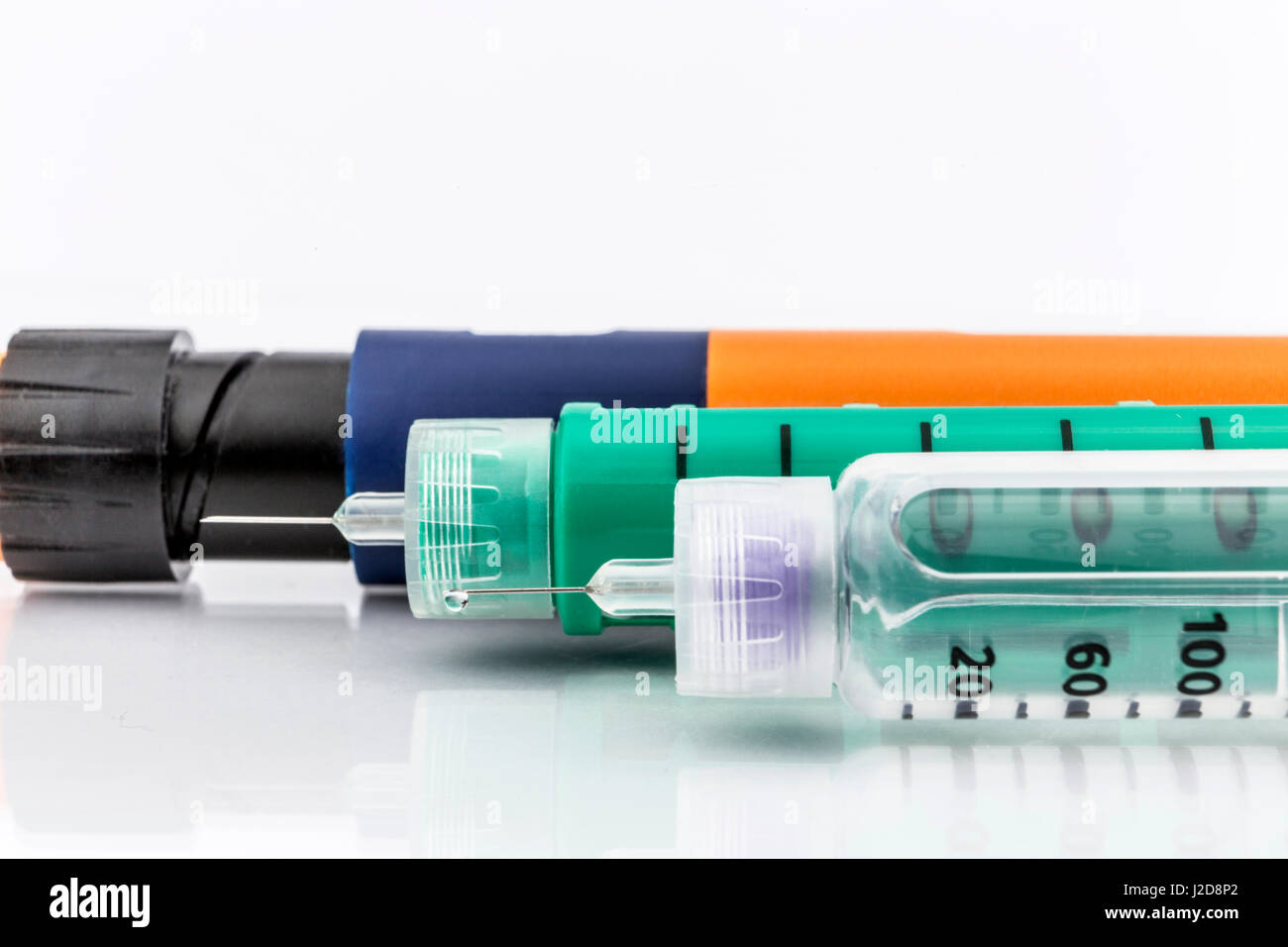 Insulin injection needle or pen for use by diabetics isolated on white