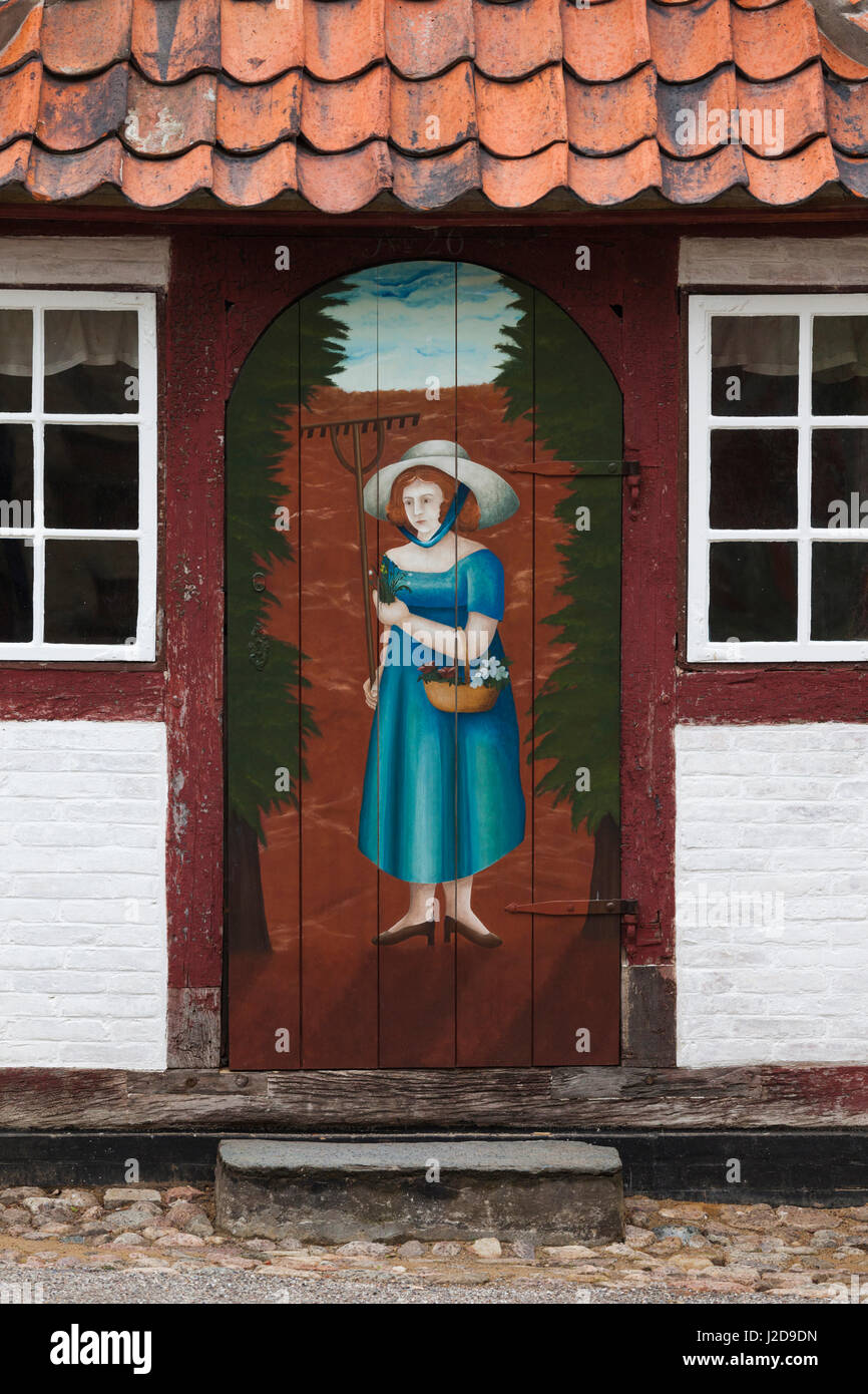 Denmark, Jutland, Aarhus, Den Gamle By, reconstructed Old Town, door with painting of woman Stock Photo