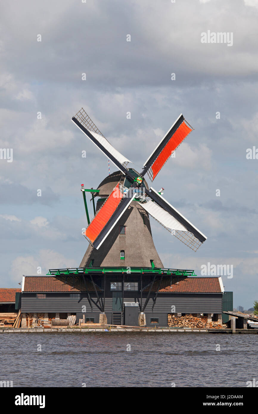 Windmills on the Zaanse schans with the former river de Zaan in the front Stock Photo