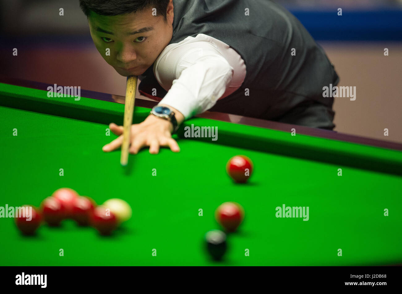 Sheffield, UK. 27th Apr, 2017. Ding Junhui of China competes during the first session of the semifinal match against Mark Selby of England during the World Snooker Championship 2017 at the Crucible Theatre in Sheffield, UK, on April 27, 2017. Credit: Jon Buckle/Xinhua/Alamy Live News Stock Photo