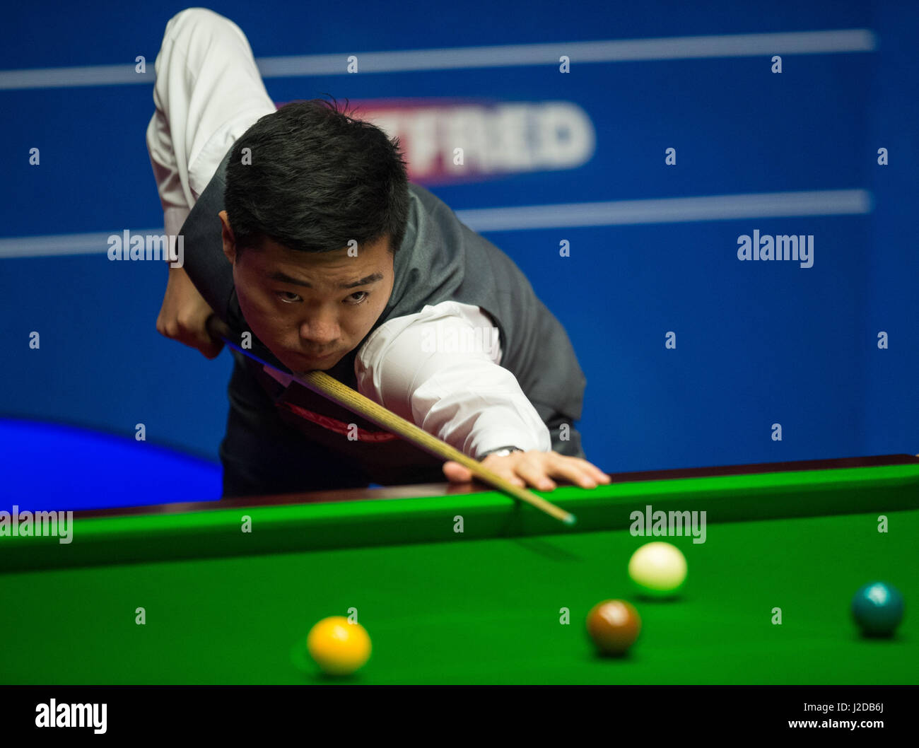 Sheffield, UK. 27th Apr, 2017. Ding Junhui of China competes during the first session of the semifinal match against Mark Selby of England during the World Snooker Championship 2017 at the Crucible Theatre in Sheffield, UK, on April 27, 2017. Credit: Jon Buckle/Xinhua/Alamy Live News Stock Photo