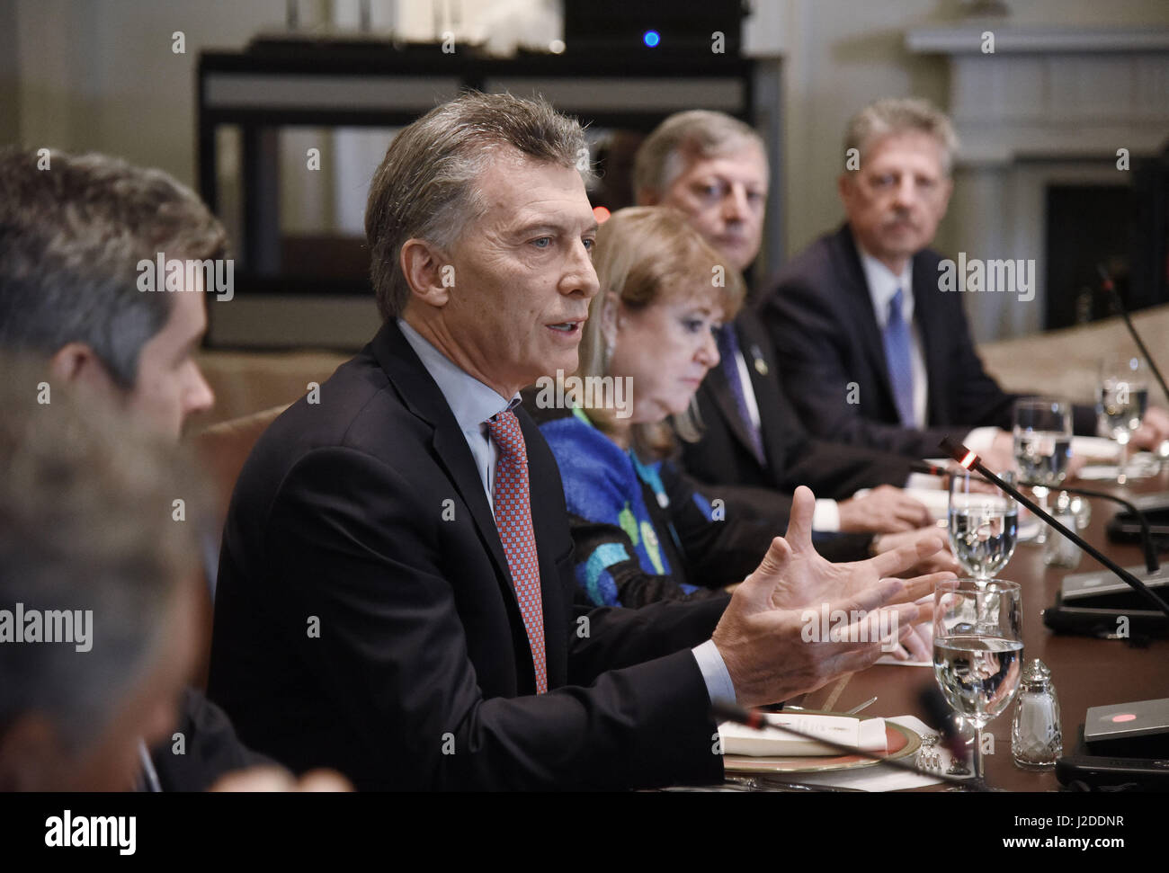 Washington, USA. 27th Apr, 2017. President Mauricio Macri of Argentina speaks during a working luncheon with President Trump in the Cabinet Room of the White House in Washington, DC, on April 27, 2017. Credit: MediaPunch Inc/Alamy Live News Stock Photo