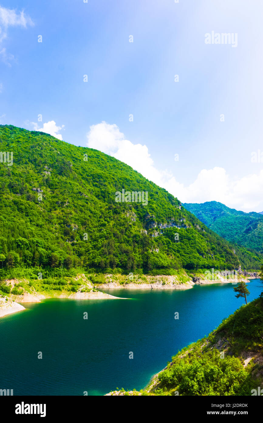 Mountain lake. Beautiful landscape with lake, forest and mountains ...