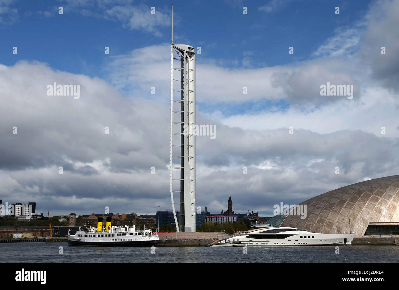 A general view of the superyacht LADY M moored next to the Glasgow Science centre on the River Clyde in Glasgow, next to the retired Clyde steamer Queen Mary. Stock Photo