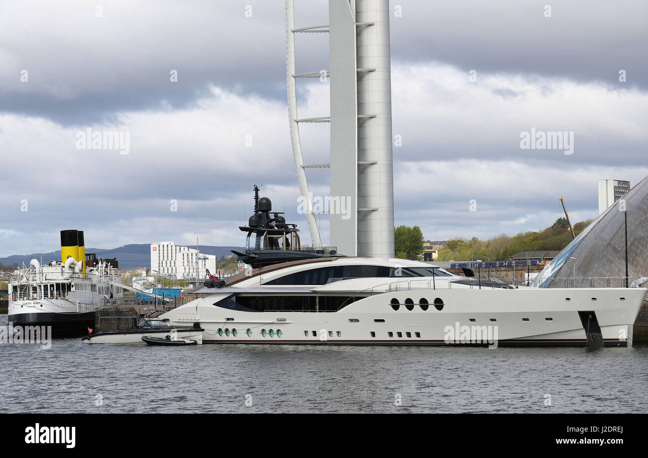A general view of the superyacht LADY M moored next to the Glasgow Science centre on the River Clyde in Glasgow, next to the retired Clyde steamer Queen Mary. Stock Photo
