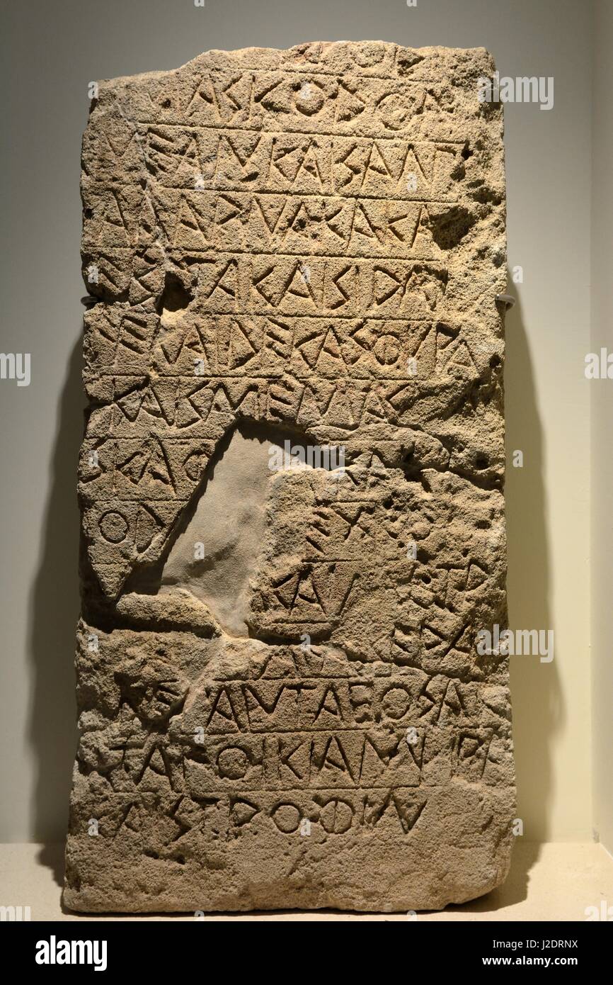 Carparo sandstone slab with Greek inscription of a sacred type in Doric dialect mid 6th century BC  National Archaeological Museum of Taranto Italy Stock Photo