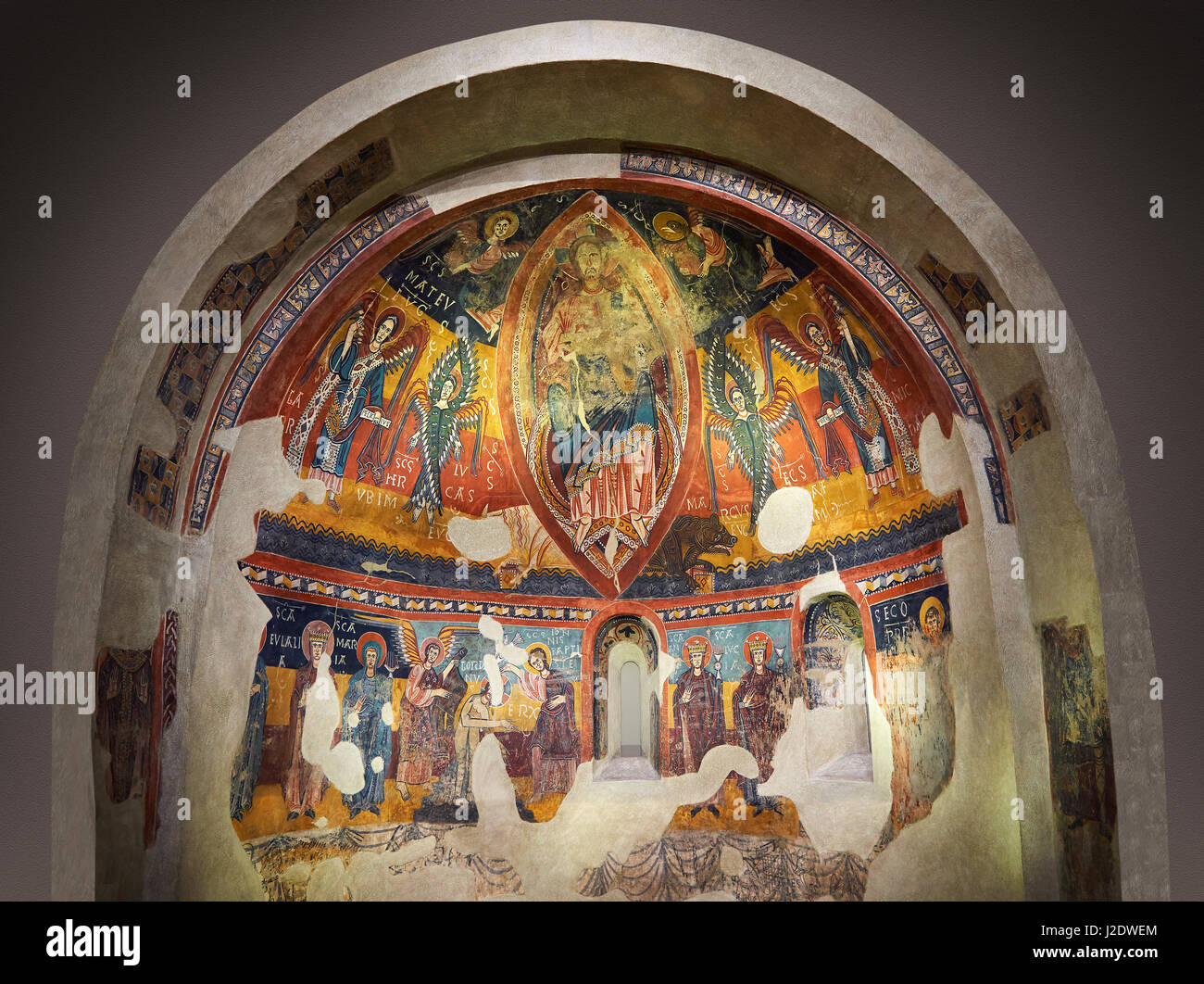 Twelfth century Romanesque frescoes of the Apse of Estaon depicting Christ Pantocrator ( In Majesty) surrounded by Byzantine style angels, and below s Stock Photo