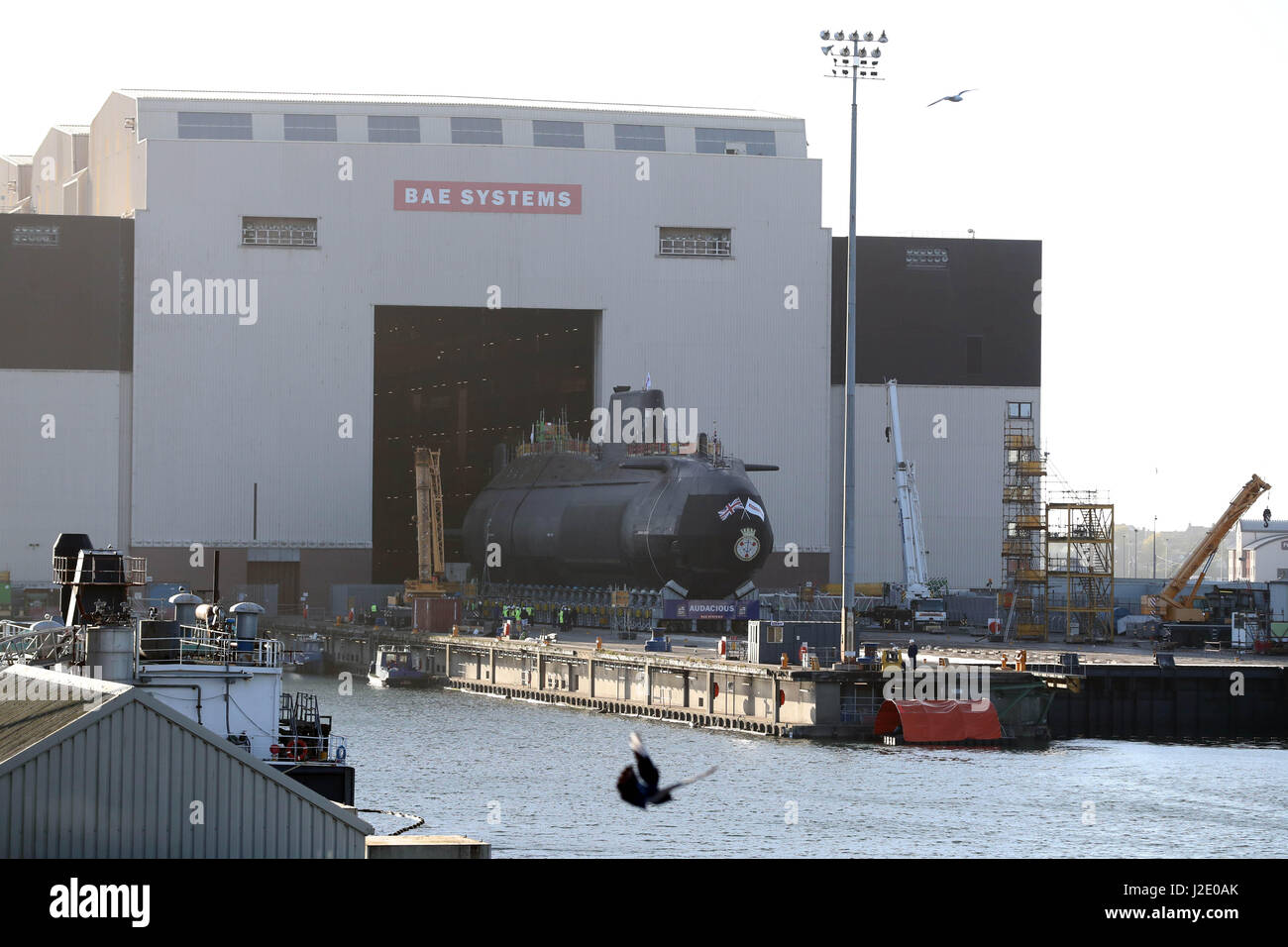 HMS Audacious is taken out of it's indoor ship building complex at BAE Systems, Burrow-in-Furness. Stock Photo