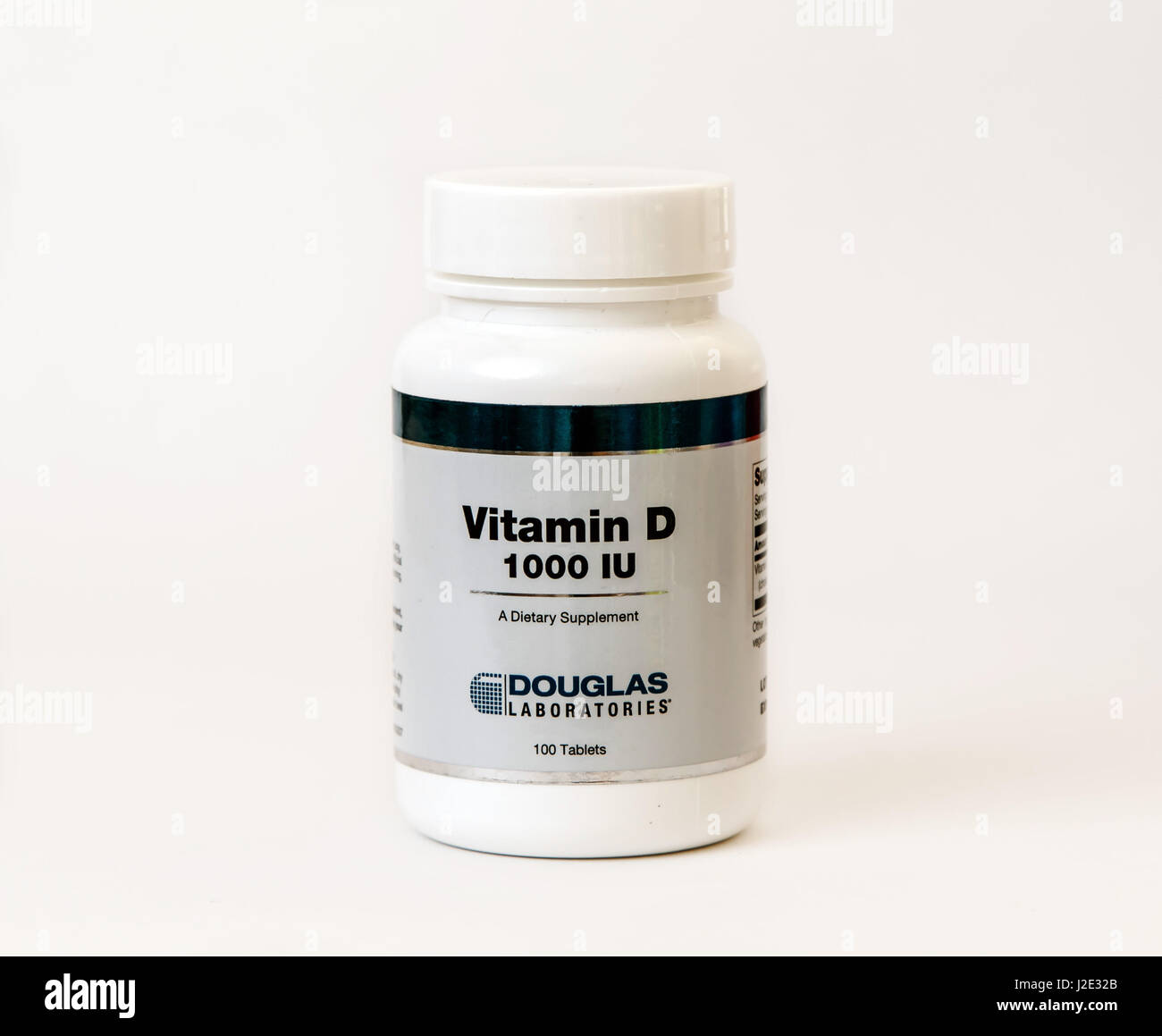 Bottle of vitamin D supplement isolated on white Stock Photo - Alamy