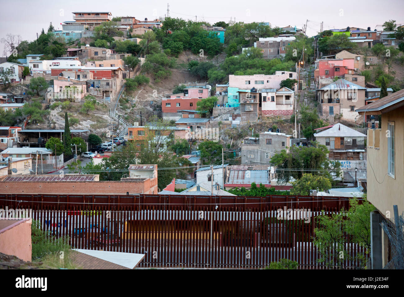 Nogales, Arizona - The U.S.-Mexico border fence separates Nogales, Arizona (foreground) and Nogales, Sonora. Stock Photo