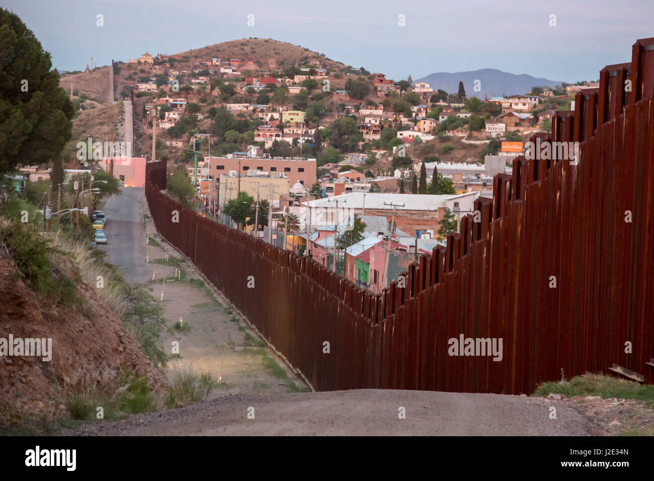 Nogales, Arizona - The U.S.-Mexico border fence separates Nogales, Arizona (left) and Nogales, Sonora. Stock Photo