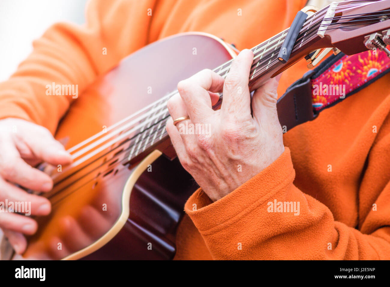 Playing and strumming beautiful electric lute guitar (Oud) close up