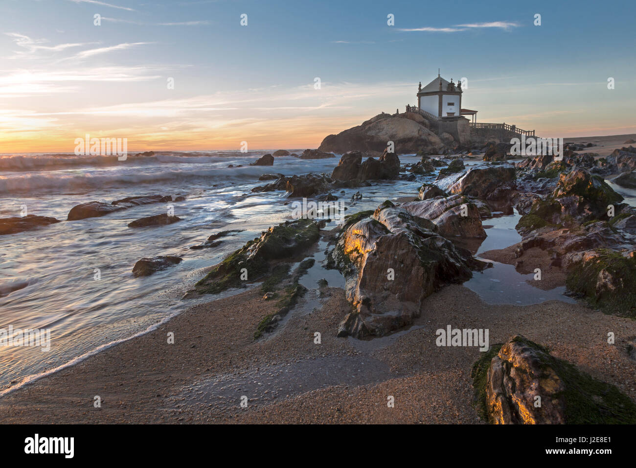 Capela do Senhor da Pedra, Chapel, rocky beach, Portugal Stock Photo