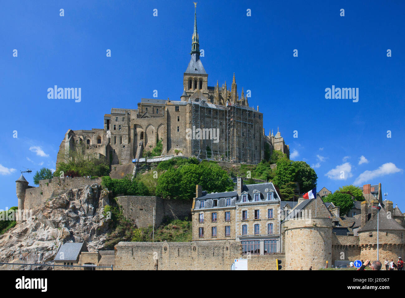 Mont Saint-Michel is an island commune in Normandy, France. It draws it name from the monastery which was present on the island since the eighth century. Stock Photo