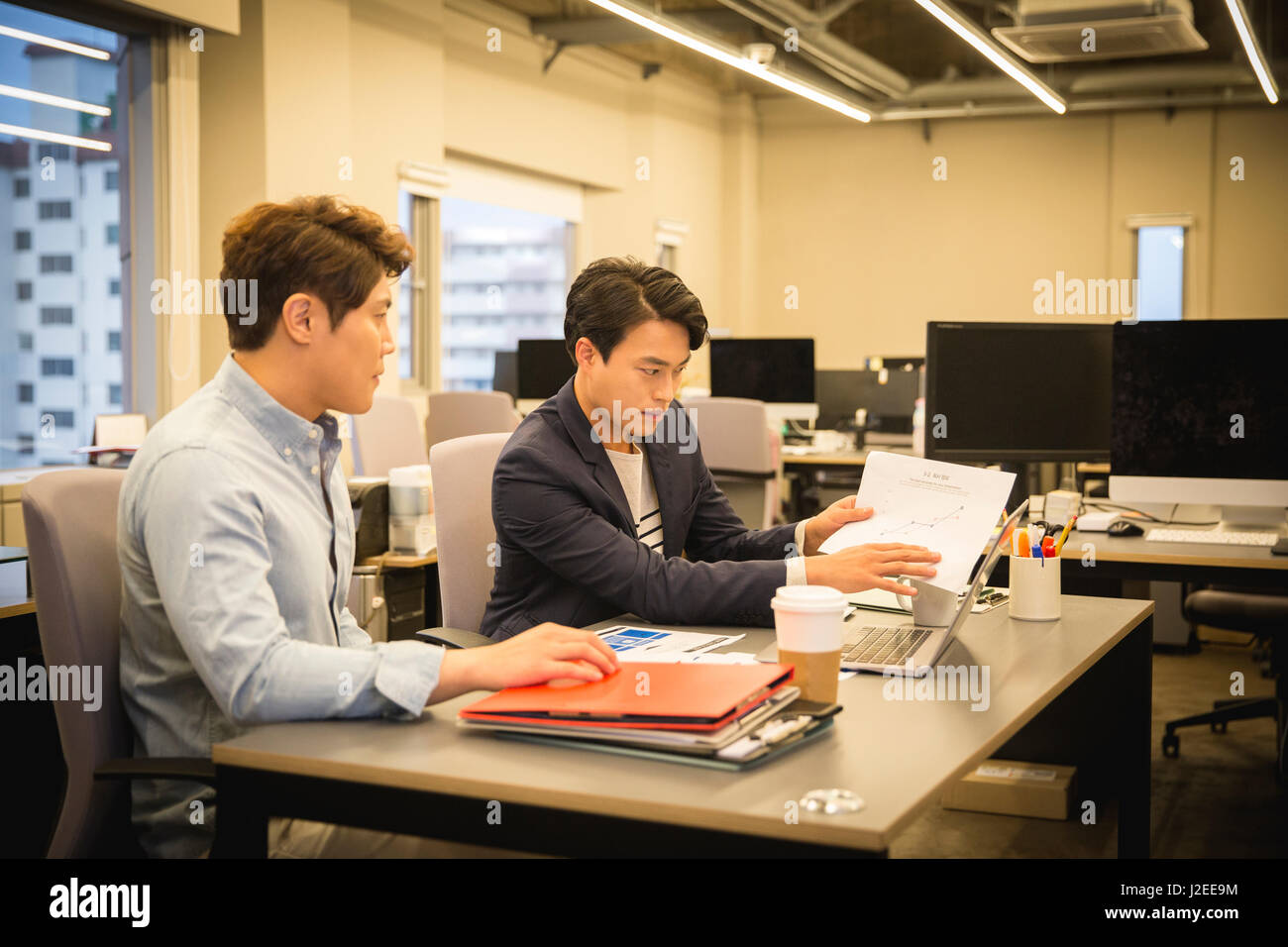 Two businessmen at office Stock Photo