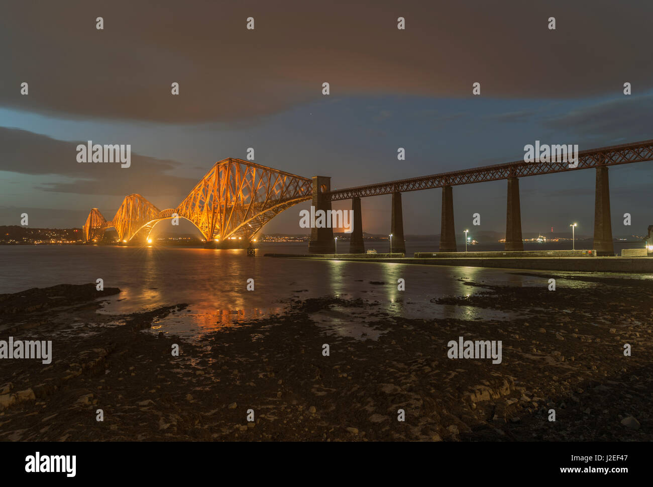 Forth Bridge at dusk looking north, South Queensferry, Lothian, Scotland, United Kingdom Stock Photo