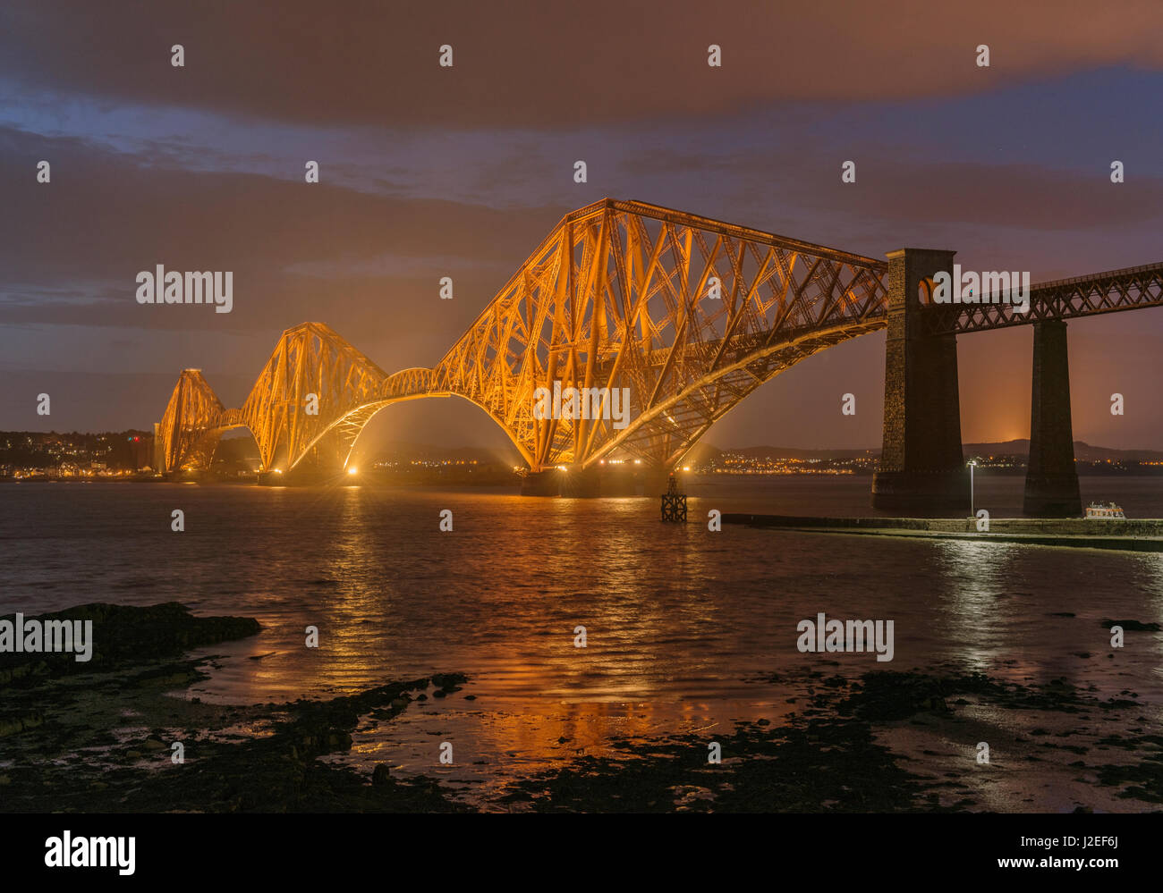 Forth Bridge at dusk looking north, South Queensferry, Lothian, Scotland, United Kingdom Stock Photo