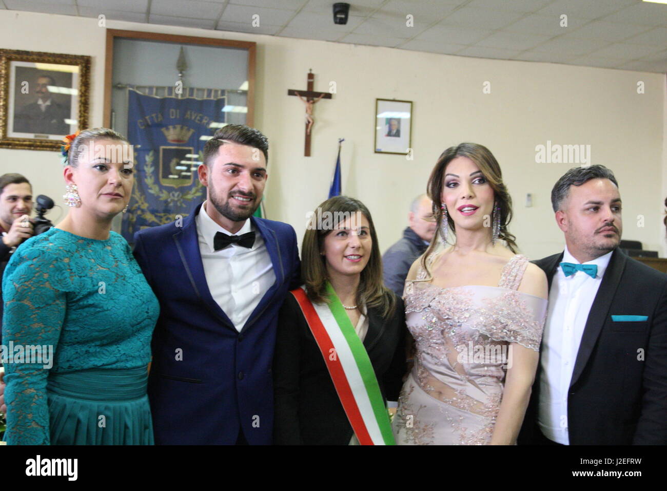 Aversa, Italy. 27th Apr, 2017. Alessia marries first trans marriage Alessia Cinquegrana, ex-miss Trans, who has been awarded the female gender recognition and recognition of the new status without going through surgery, married Aversa Town Hall with comrade Michele Picone.In picture in order L to R:wedding witness, Michele Picone, registrar, Alessia Cinquegrana, wedding witness Credit: Salvatore Esposito/Pacific Press/Alamy Live News Stock Photo