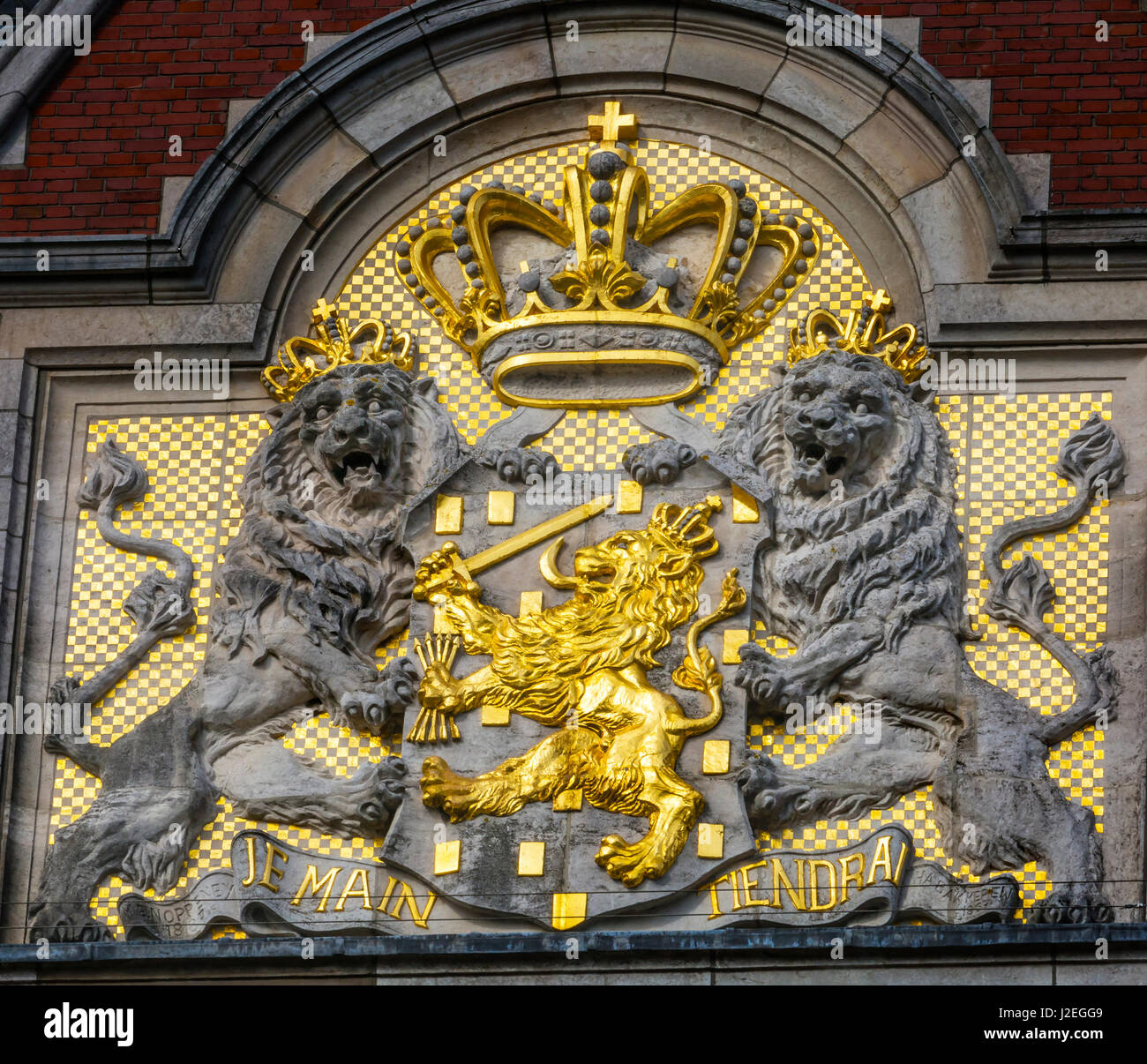 Netherlands Coat of Arms Amsterdam Holland On Building Facing the Canal. Also symbol of Monarchy. Combines Lion of Dutch Republic Stock Photo - Alamy
