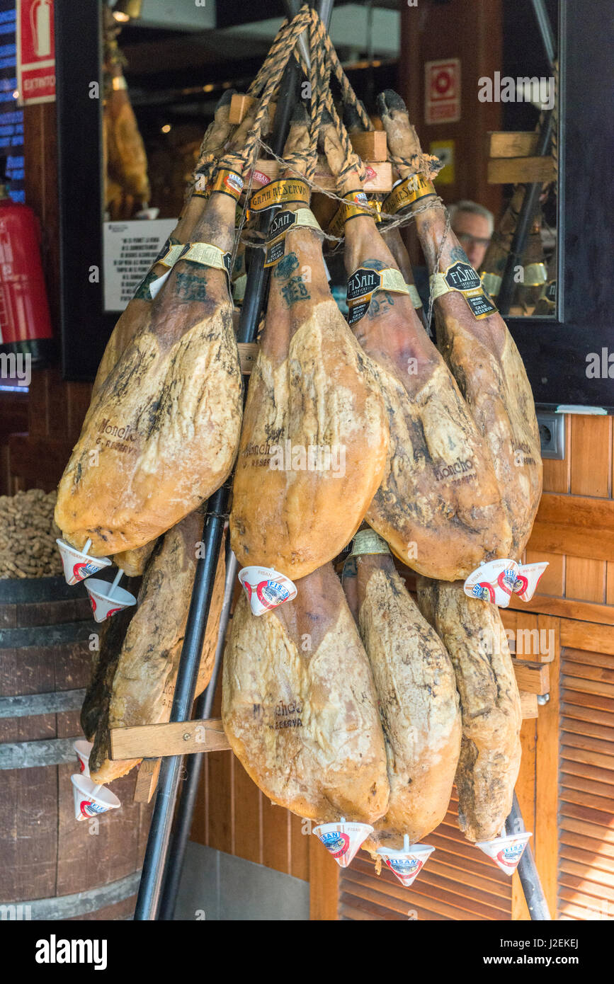 Spain, Barcelona, Iberico ham hanging in store (Large format sizes ...